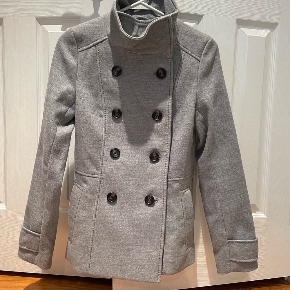 Woman’s gray pea coat